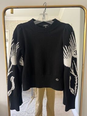CHANEL Black & White Crewneck Sweater with Crane Sleeve Motif